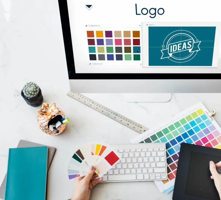 Écran de création de logo, nuanciers de couleurs et tablette graphique